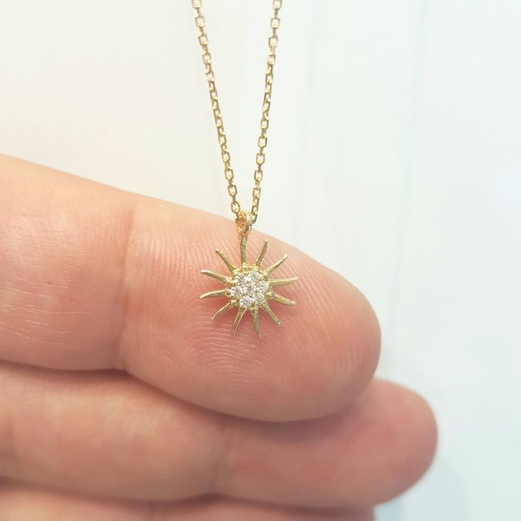 -The sun shaped pendant is made with high-quality 14K solid gold. Also we have listed bracelet and earrings with the same models. So you can combined them. https://www.etsy.com/shop/LatikaJewelryShop - High polish finish and set with flawless cubic zirconia stones. - This dainty, delicate and trendy pendant necklace has been artfully designed for timeless yet modern millennial fashion and you can order in three different colors, yellow , white and rose. - This 14K solid gold pendant comes with a Dazzling 14k Gold Hallmarked Jewelry, Dazzling Hallmarked Necklace For Gift, Dazzling Hallmarked Necklace Gift, Dainty Yellow Gold Jewelry For Celebration, Gold Jewelry With Brilliant Cut As Gift, Handmade Diamond White Jewelry For Gift, Dainty Gold Jewelry For Celebration, Handmade Diamond White Jewelry As Gift, Handmade Diamond White Jewelry Gift