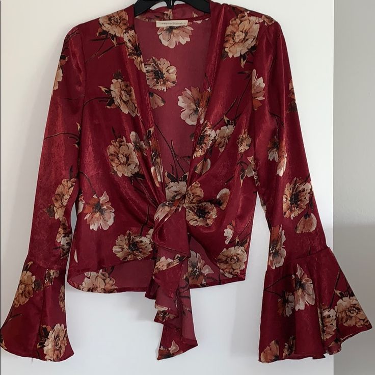 Red Silky Floral Blouse With Front Tie. Long Bell Shaped Sleeves. Never Worn- New Condition Burgundy Blouse For Spring Party, Red Bohemian Blouse For Brunch, Red Blouse For Fall Brunch, Red Floral Print Blouse For Brunch, Red Floral Print Tops For Party, Red Floral Print Party Blouse, Red Floral Blouse, American Threads, Floral Blouse