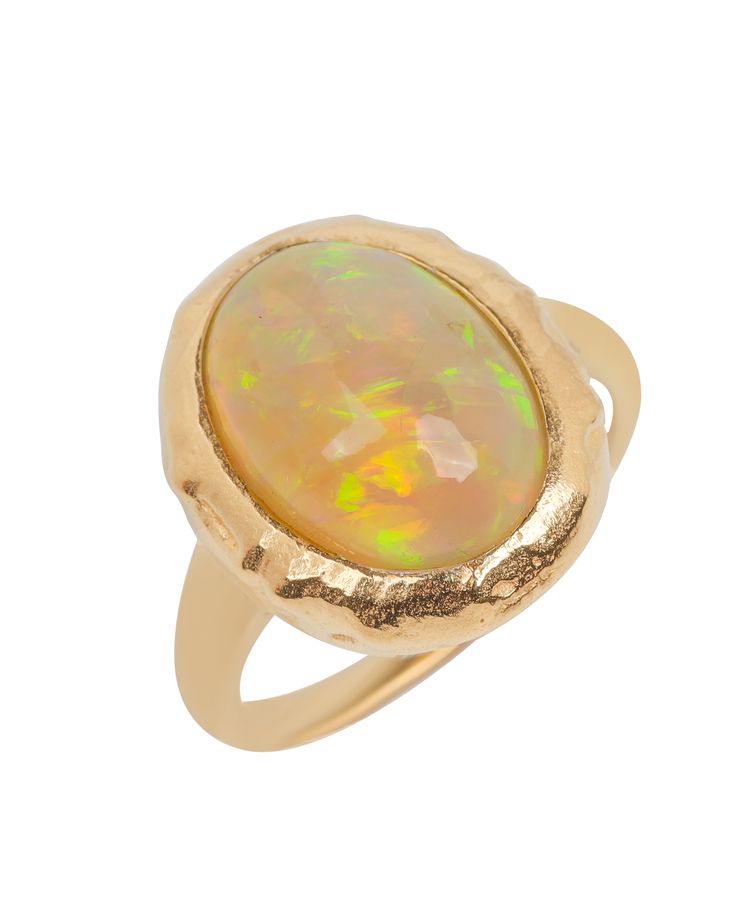 The name opal evolved from the Roman word "opalus" which traces its roots from the Greek's "opallios " meaning to see a change of color. This Greek word is likewise a revision of the ancient Indian Sanskrit's "upala " which means precious stone. The development of this gemstone started millions of years ago when a mixture of silica and water flowed into cracks and holes in the ground. Over time it hardened and solidified to turn into opal.Gemstone - Opal (Composition - Natural, Enhancement - No 10k Gold Ring, Ethiopian Opal Ring, Wear Necklaces, Geometric Ring, Geometric Necklace, 14k Gold Ring, Opal Ring, Gemstone Engagement Rings, Contemporary Jewelry