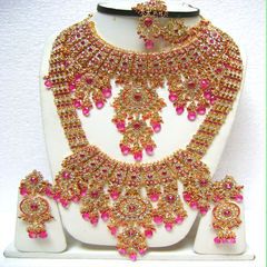 Gold Rodium Polish Pink and Majenta color Bridal Jewelry in Metal Alloy studded with Cubic Zirconia, Kundan Kundan Set, Bridal Necklace Set, Utsav Fashion, Indian Jewelry Sets, Studded Necklace, Bollywood Jewelry, Stone Studs, Bridal Jewelry Sets, Bridal Necklace