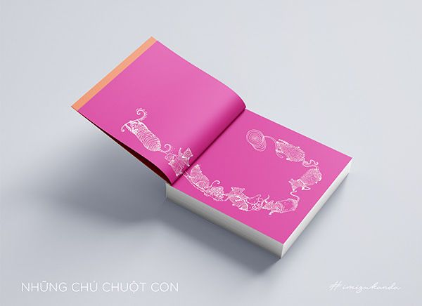 an open pink book with white designs on it