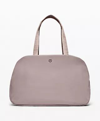 Go Getter Bag 2.0 | Women's Bags | lululemon Lululemon Bag With Removable Pouch For Everyday Use, Lululemon Rectangular On-the-go Bag, Classic Commuting Bag With Removable Pouch, Sporty Standard Backpack For Commuting, Modern Everyday Luggage With Double Handle, Lululemon Rectangular Bag With Adjustable Strap, Lululemon Shoulder Bag With Removable Pouch For On-the-go, Versatile Lululemon Shoulder Bag For Everyday Use, Modern Gym Bag With Adjustable Strap