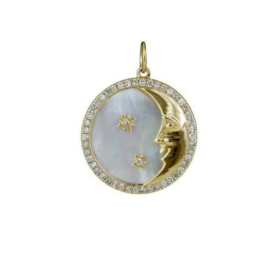 "Pure and precious Be the fortunate one to own this unique 8.265carat MOP pendant divinely embellished with 0.369carat diamonds around the splendid stars. Set in 3.215gms of 14K yellow gold, the 21mm round pendant weighs 4.942gms. Please contact us for bulk discount upto 40%. All weight and dimensions are approximate. It varies everytime we produce it. -----------------------------------------------------> Features : Gold KT : 14K Solid Made to Order : Yellow Gold, Rose Gold, White Gold Diamo Yellow Gold Moon-shaped Charm Jewelry, Yellow Gold Moon-shaped Jewelry With Charms, White Gold Celestial Jewelry With Moon Charm, Celestial Jewelry With Round Pendant Charms, Celestial White Gold Jewelry With Moon Charm, Celestial Jewelry Round Pendant With Polished Finish, Celestial Jewelry With Star Charm Round Pendant, Celestial Style Jewelry With Star Charm Round Pendant, Celestial Round Pendant With Polished Finish