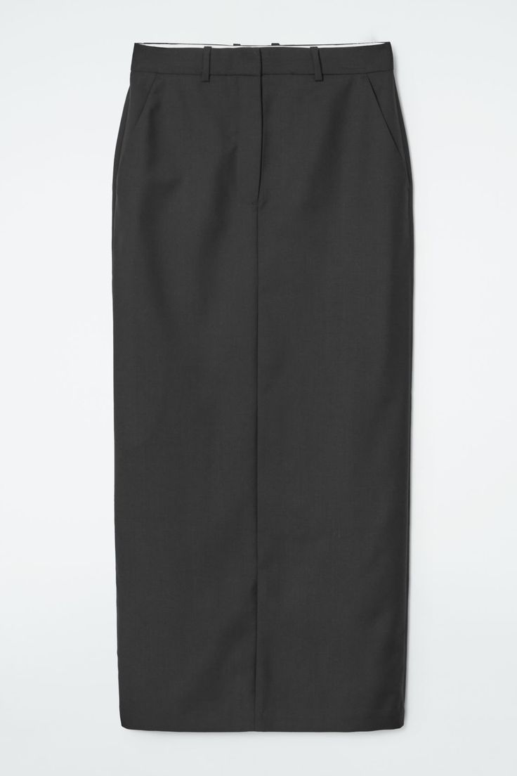 Embrace a modern approach to tailoring with this wool skirt from the Autumn Winter 2023 collection. It's cut to a maxi length that's key for the season and retains some of the classic hallmarks of suiting, like the belt loops and neat welted pockets. It's innovatively designed with an elasticated tab that allows you to wear it low slung or higher on the waist.  Belt loopsSide slip pocketsBack vent 100% Wool / Dry clean Back length of size 6 is 38.58" / Model wears a size 6 Wool Midi Skirt For Workwear, Tailored Midi Skirt For Workwear, Formal Long Pencil Skirt For Fall, Wool Lined Skirt For Workwear, Elegant Wool Skirt For Formal Occasions, Tailored Long Skirt For Work, Wool Workwear Skirt, Wool Skirt For Workwear, Elegant Workwear Skirt With Straight Hem