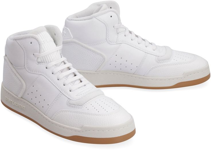 Indulge in the ultimate luxury with these SL/80 leather high-top sneakers. Crafted from the finest 100% cow hide, these sneakers exude elegance and sophistication. The perforated leather and round toe line add a touch of timeless style, while the 100% rubber sole ensures durability and comfort. Whether you're dressing up a casual outfit or adding a luxurious touch to your activewear, these sneakers are the perfect choice for the fashion-forward individual who values quality and style. Elevate yo Leather High Tops, Leather Cap, Cow Hide, Perforated Leather, Beach Tote Bags, Handbag Backpack, Sneakers White, Sneakers For Sale, Mens Shoes Sneakers