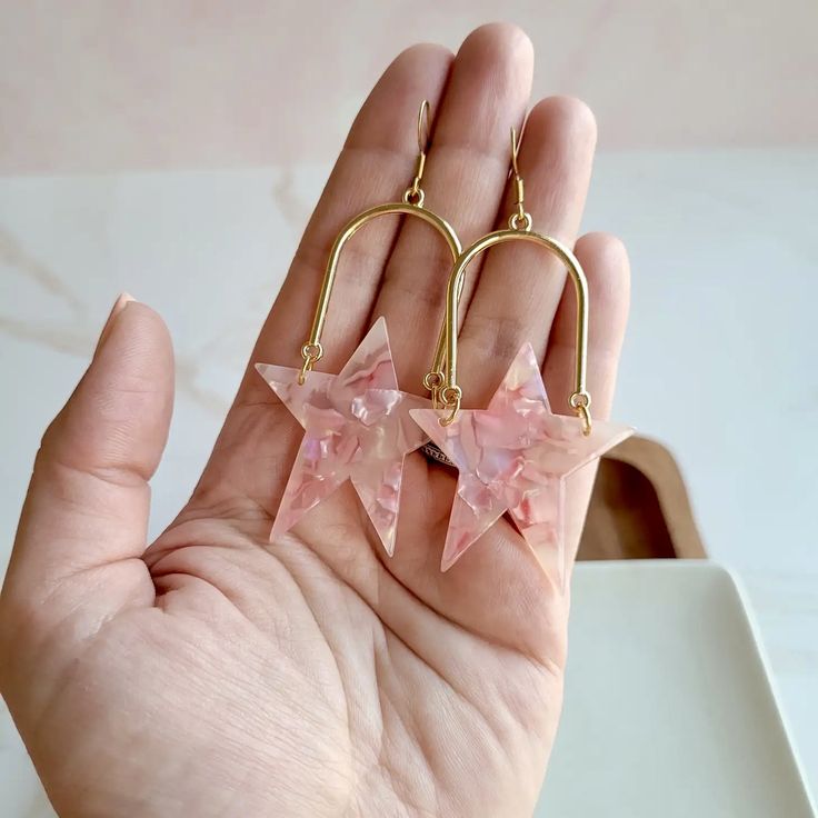 Stunning Pure Favor Earrings 😍 Pink Pierced Earrings As Gift, Pink Star Earrings For Party, Pink Star-shaped Jewelry For Party, Pink Star-shaped Party Earrings, Rose Gold Star Charm Earrings, Trendy Star Embellished Jewelry For Gifts, Trendy Star Embellished Jewelry Gift, Trendy Pink Plug Earrings As Gift, Trendy Star-embellished Jewelry Gift