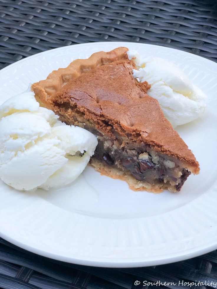 an easy chocolate chip pie on a plate with ice cream