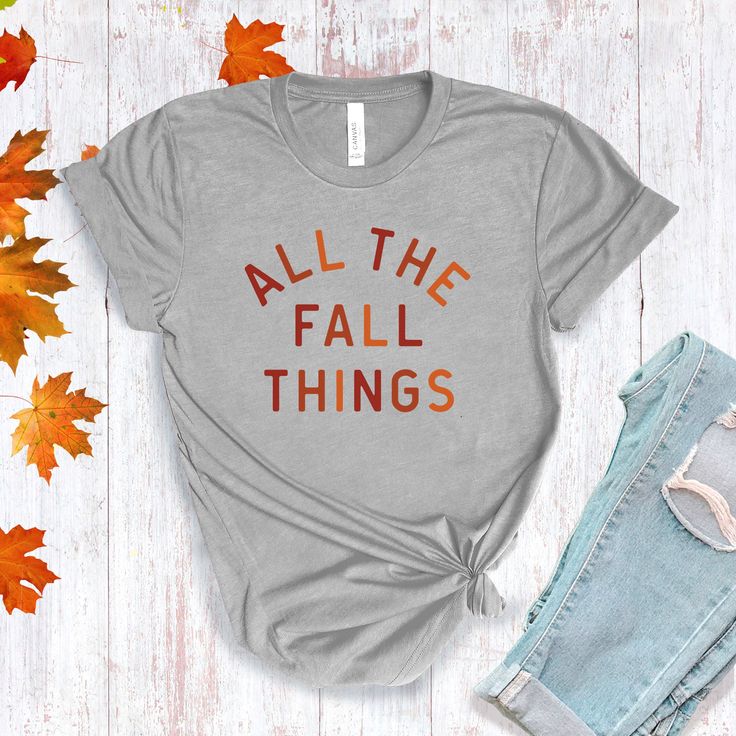 All The Fall Things in a modern font graphic on front in cream or multi Fall colors. Youth Sizes S-XL (unisex sizing) Toddler Sizes 2T, 3T, 4T To view All The Fall Things Adult T-shirts click here.To view All The Fall Things Baby Bodysuit click here.Bella + Canvas4.2 oz. Airlume combed and ring-spun cottonPre-shrunkFor a more relaxed fit, size up! Trendy Screen Print T-shirt For Fall, Everyday Fall Slogan T-shirt, Fall Graphic Print T-shirt, Fall Graphic Tee Soft-washed, Fall Slogan T-shirt Relaxed Fit, Fall Slogan T-shirt With Relaxed Fit, Fall Graphic Print T-shirt For Everyday, Tri-blend Graphic Tee For Fall, Everyday Fall T-shirt With Letter Print