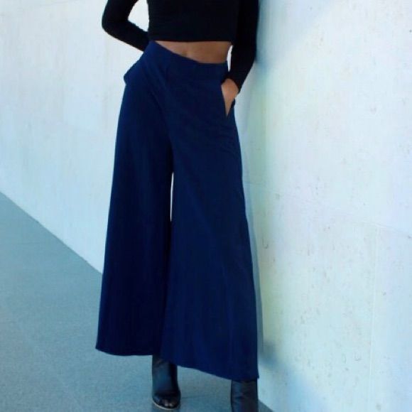 Split Wide Leg Pants. 25 1/2" Inseam; 45" Leg Opening; 13 1/2" Front Rise; 15" Back Rise (Size 8 Topshop Size 4 Us) Chic Blue Wide Leg Pants For Fall, Blue Pants With Pockets For Business Casual, Blue High-waisted Pants For Fall, Blue Business Casual Pants With Pockets, Business Casual Blue Pants With Pockets, Blue Business Casual Bottoms With Pockets, Business Casual Blue Bottoms With Pockets, Blue Wide Leg Pants For Fall, Navy Trousers For Office