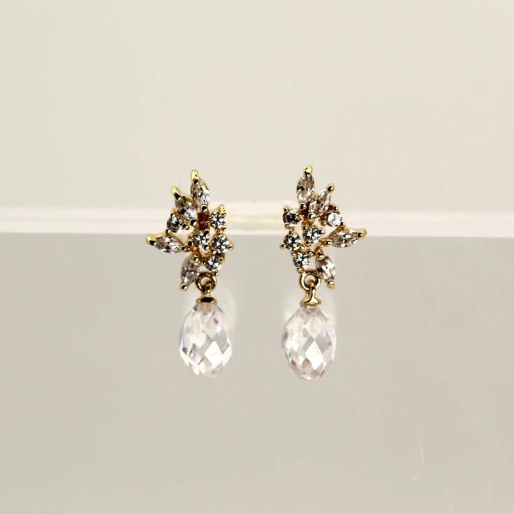 Bridal Floral Dangle Earrings | VicStone.NYC Clip-on Drop Earrings For Bridal Evening, Wedding Teardrop Diamond Single Earring, Single Teardrop Diamond Earring For Wedding, Teardrop Diamond Single Earring For Wedding, Elegant Wedding Diamond Earrings For Pierced Ears, Dainty Teardrop Diamond Earrings For Weddings, Delicate Single Diamond Earring For Wedding, Elegant Teardrop Earrings For Weddings, Classic Bridal Earrings With Elegant Design For Party