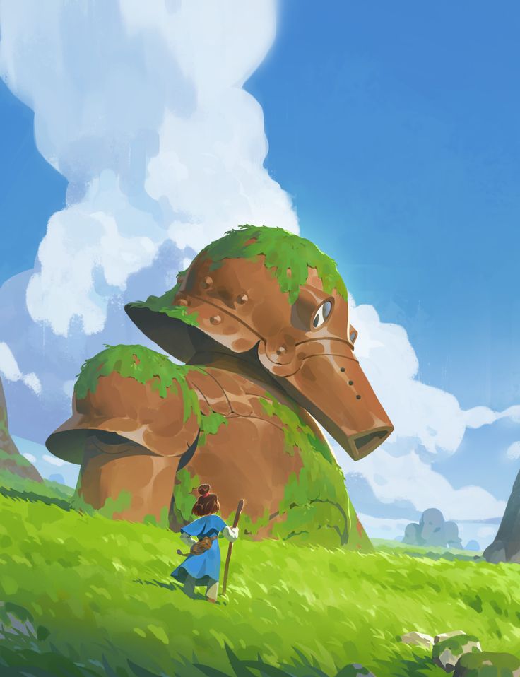 a person standing in the grass near a giant animal