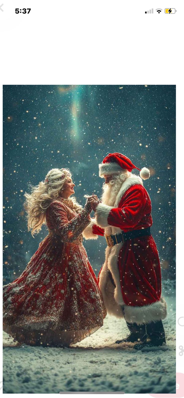 santa and mrs claus dancing in the snow with one holding his hand out to each other