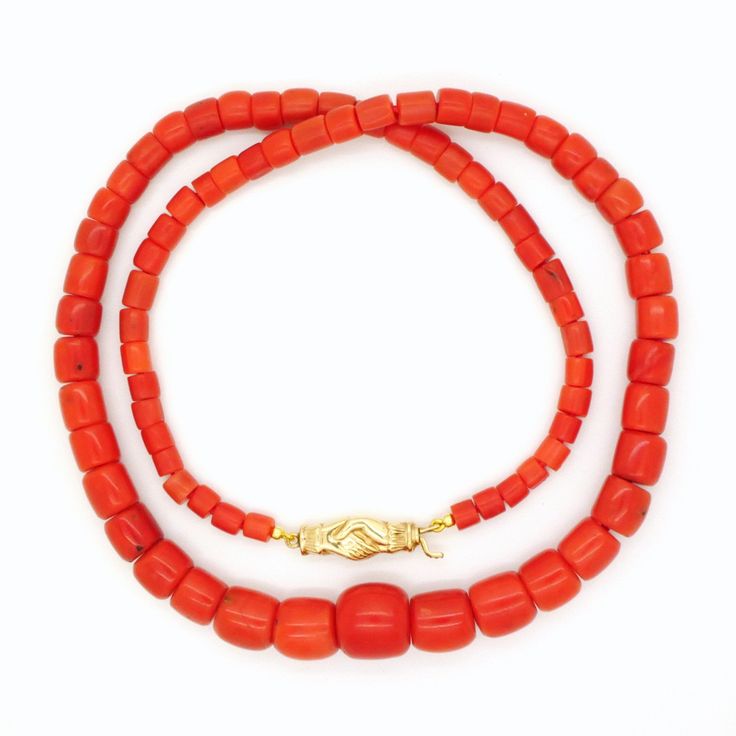 One of a kind antique natural salmon red coral necklace with a handcrafted 14 carat gold hands in faith clasp. A unique piece of traditional old Dutch jewelry from late 1800's (so-called Klederdracht jewelry). High quality genuine Mediterranean red coral, NOT dyed. The color we would describe as salmon red. The coral beads were professionally tested on authenticity by several tests. The necklace will be shipped in a gift box. Length: 22 inches / 55 cm - it's a classical princess length necklace, Hand-strung Red Coral Jewelry For Gifts, Hand-strung Red Coral Jewelry Gift, Hand-strung Red Coral Jewelry As A Gift, Gift Jewelry With Hand-strung Red Coral, Traditional Single Strand Coral Jewelry, Orange Single Strand Red Coral Jewelry, Hand-strung Red Coral Jewelry In Coral Color, Hand-strung Red Coral Jewelry, Spiritual Orange Jewelry With Red Coral