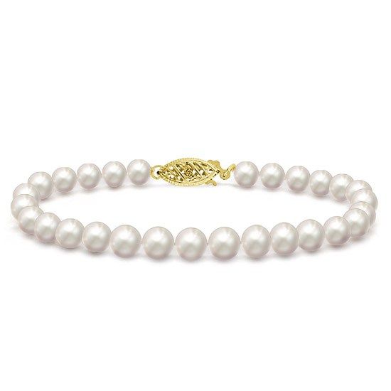 This dainty white Freshwater pearl bracelet adds instant elegance to any outfit. The small 5.0-5.5mm sizes are highly versatile, and the AAA quality pearls have been selected for their bright luster and delicate pastel overtones. Pearls are knotted on white silk and finished with a 14k gold clasp. White Akoya Pearl Chain Bracelet, Classic Yellow Gold Pearl Drop Bracelet, Elegant Hypoallergenic Beaded Bracelets For Anniversary, White Akoya Pearl Bracelet With Pearl Charm, Single Strand Akoya Pearl Bracelet In Pearl White, White Akoya Pearl Charm Bracelet, Classic White Gold Bracelets With Pearl Drop, Classic White Gold Bracelet With Pearl Drop, Elegant Single Strand Pearl Bracelet For Anniversary