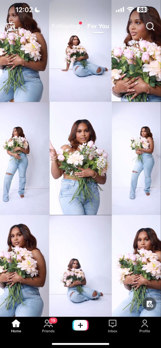 the woman is holding flowers and posing for her photo shoot in front of a white background