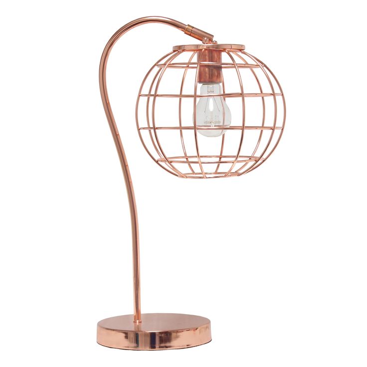 a copper colored lamp with a wire ball on the base and a light bulb attached to it