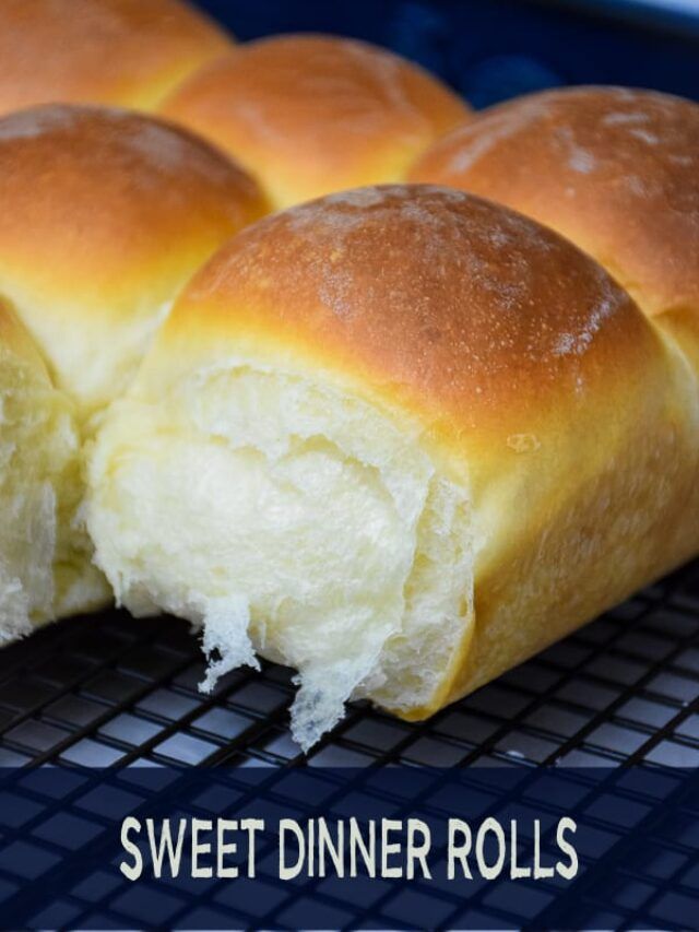 the buns have been cut in half and are sitting on a cooling rack with text overlay that reads, sweet dinner rolls