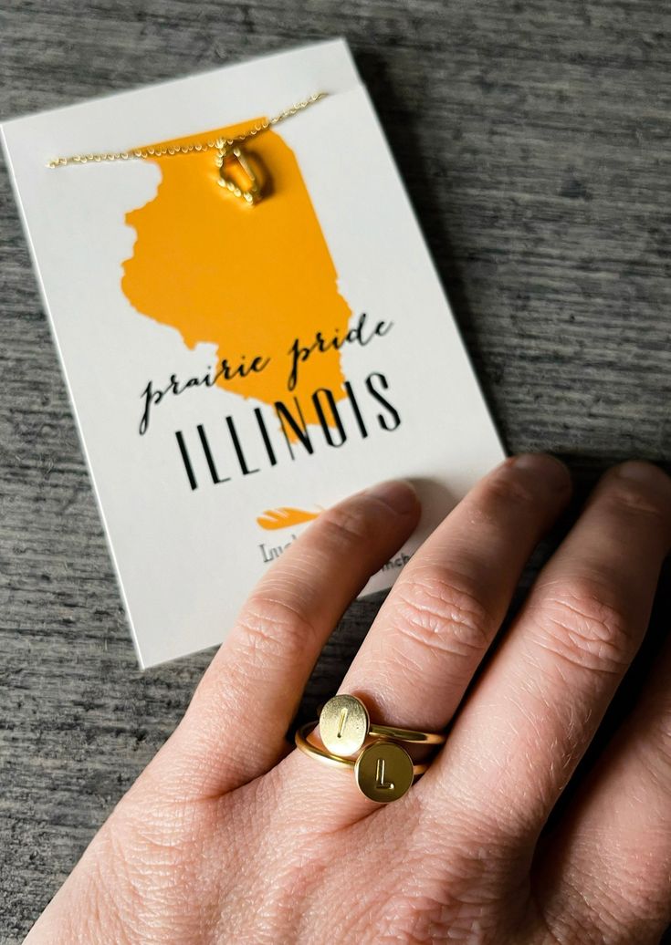 14k gold dipped, nickel-free, and adjustable signet ring with letterpress "L" initial. Fits most ring sizes and is perfect for stacking! Stack it with the "I" if your an Illinois fan! Comes in a unique, giftable ring box. Adjustable Hand Stamped Initial Ring For Gift, Adjustable Nickel-free Signet Ring As Gift, Adjustable Monogram Open Ring Jewelry, Adjustable Gold Initial Ring With Monogram, Adjustable Gold Monogram Initial Ring, Adjustable Yellow Gold Initial Ring Gift, Minimalist Hand Stamped Initial Ring As Gift, Minimalist Adjustable Initial Ring For Personalized Gift, Adjustable 14k Gold Signet Ring As Gift