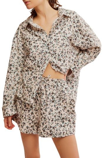 These floral-print knit pajamas featuring a high-low button-up top and drawstring shorts are cut from pure cotton to keep you cool all night long. Top: 25 1/2" front length; 30" back length (size Medium) Bottoms: 3" inseam; 27" leg opening; 13 1/2" front rise; 17 1/2" back rise (size Medium) Top has spread collar; long sleeves 100% cotton Machine wash, tumble dry Imported Floral Print Relaxed Fit Sleep Top, Casual Floral Print Pajama Shorts For Sleep, Floral Print Relaxed Top For Pajama Party, Floral Print Long Sleeve Sleepwear For Vacation, Casual Long Sleeve Sleepwear With Floral Print, Casual Long Sleeve Floral Print Sleepwear, Summer Floral Print Long Sleeve Sleepwear, Long Sleeve Floral Print Summer Sleepwear, Casual Floral Print Pajama Shorts For Loungewear