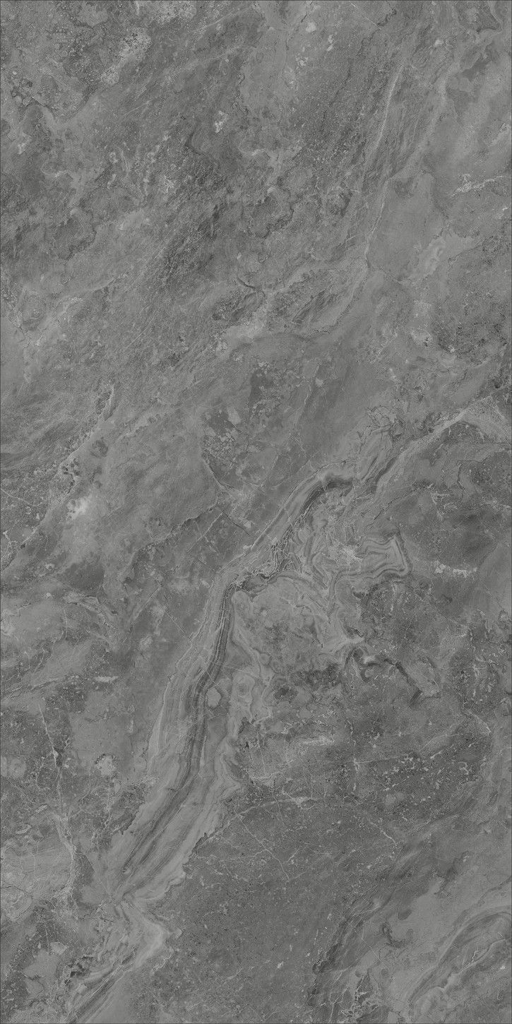 a black and white photo of a marble floor with grey veining on it's surface