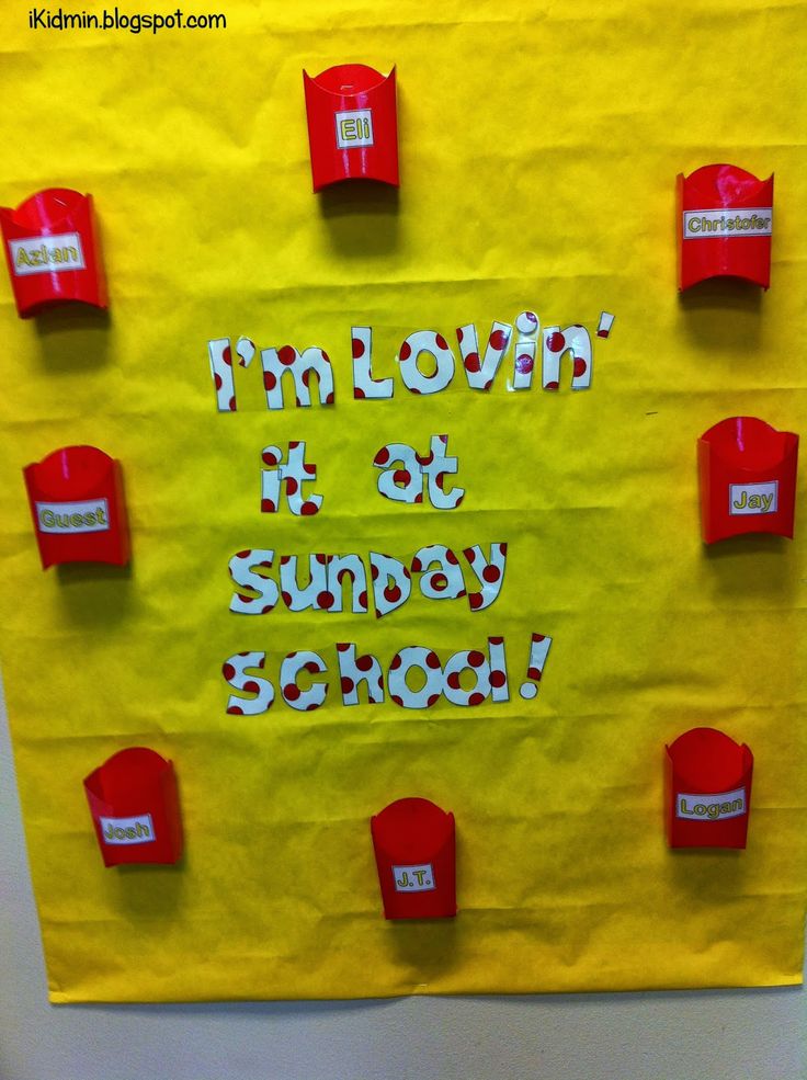 a bulletin board that says i'm lovin it at sunny school with red mailboxes