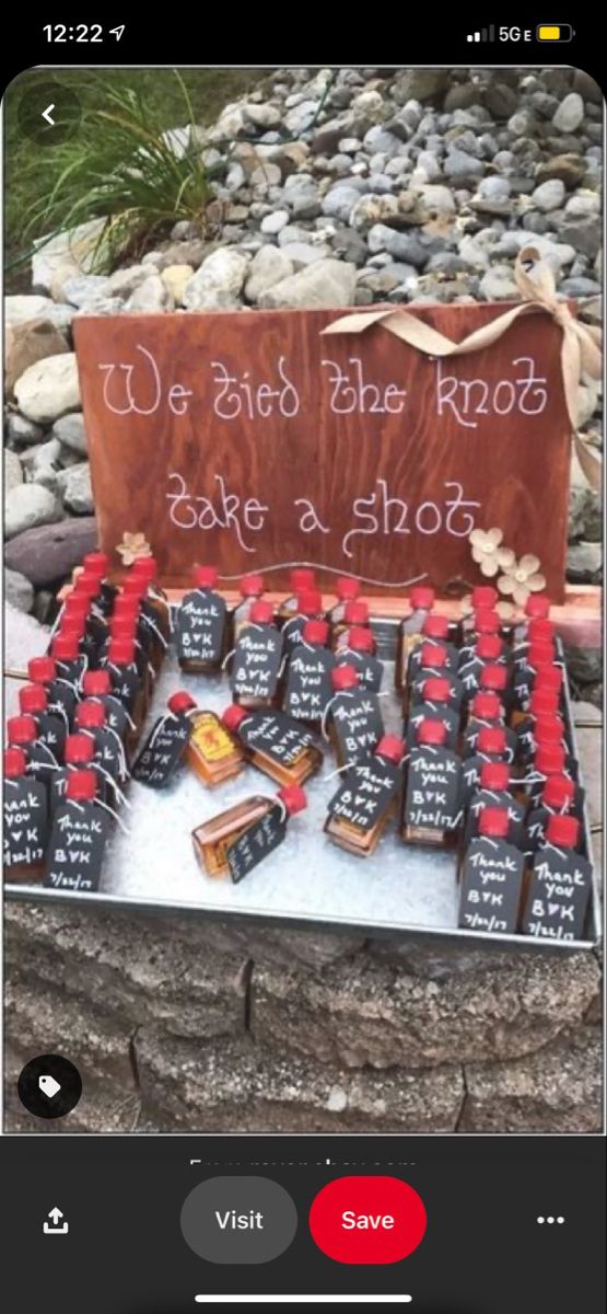 a table topped with lots of chocolate covered cookies and candies next to a sign that says we sold the kool cake a shot