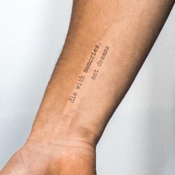 a person's arm with a tattoo that reads, let it be true and false