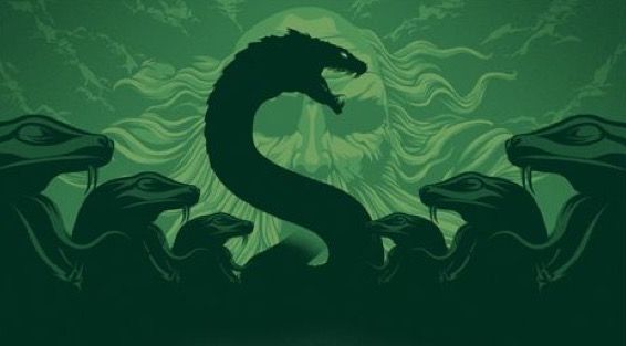 the cover to harry potter and the chamber of secrets, with an image of a dragon