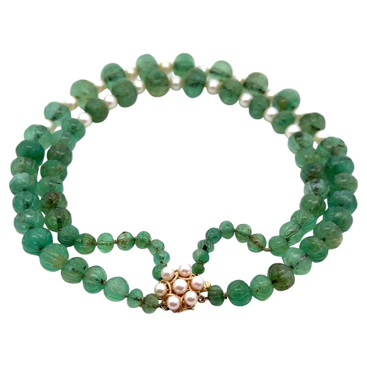 --Stone(s):-- Numerous Graduated Natural Genuine Emeralds - Carved Bead Shape - Strung - Green Color - Natural Inclusions - 7mm to 15.1mm (approx.)** See Certification Details Below for Complete Info ** Numerous Genuine Cultured Pearls - Bead Shape - Strung - White Color - 4.6-7.8mm (approx.) Material: String w/ Solid 14k Yellow Gold Clasp Total Weight: 123.20 Grams Length: 15 Inches (wearable length) Clasp: Push Clasp w/ Safety Latch Condition: Vintage. Natural inclusions on emeralds. Some surface reaching. Comes w/ the original GIA certification for 1 randomly emerald. Stock Number: MK-390188858 --Certification Details:-- Laboratory: GIA Report Type: Emerald Report GIA Report Number: 7235387909 Shape: Carved Rondelle Bead Transparency: Transparent Color: Green Species: Natural Beryl Vari Japanese Pearls, Layered Pearl Necklace, Emerald Bead, Pearl Diamond, Multi Strand Necklace, Amethyst Stone, Strand Necklace, Cultured Pearls, Multi Strand