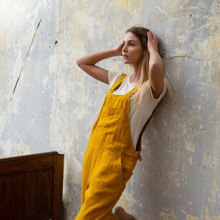 Feeling excited about rising temperatures? Tap into your inner, most optimistic child with this playful romper. Designed for maximum comfort during warm days, the organic jumpsuit is sustainably made from 100% Linen which is well-known for its moisture-wicking properties. Plus, you can wear this linen jumpsuit for any occasion – for beach trips, walks in the park, and outdoor happy hours. Without much thought, throw a Merino wool tee into the mix to channel a look that never dates. With a classi Pinafore Jumpsuit, Overall Romper, Linen Pinafore, Romper Summer, Summer Jumpsuit, Womens Jumpsuits, Linen Clothing, Jumpsuit Summer, Wool Clothing