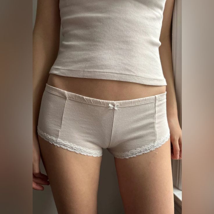 Soft Cotton 'Hipster' Style Undies With A Lace Trim And Bow Details. All Intimates Are Final Sale. Fabrics: 100% Cotton Measurement: 4" (10cm) Rise, 20" (51cm)Waist (Stretches) Made In: Italy Fitted Cotton Sleepwear Of Short Length, Fitted Cotton Short Length Sleepwear, Fitted Cotton Short Sleepwear, Big Cardigan, Brandy Melville Outfits, Kira Kosarin, Fever Dream, Waist Stretches, Goals Inspiration