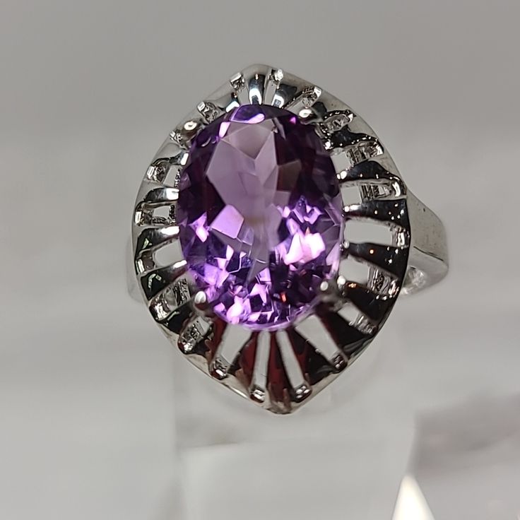 Gorgeous, Huge 7.25 Carats Of Beautifully Faceted, Oval Cut, Sparkling Amethyst Rhodium Over Sterling Silver Ring. Weight Is 5 Grams, A Size 9.5. New. Thanks For Shopping My Closet! Modern Oval Silver Gemstones, Silver Amethyst Ring With Accent Stones For Formal Occasions, Polished Amethyst Ring For Anniversary, Polished Amethyst Anniversary Ring, Oval Amethyst Sterling Silver Ring For Formal Occasions, Hallmarked White Gold Amethyst Ring, Silver Amethyst Gemstones For Formal Events, Oval Hallmarked Amethyst Ring In White Gold, Formal Silver Amethyst Ring With Halo Setting