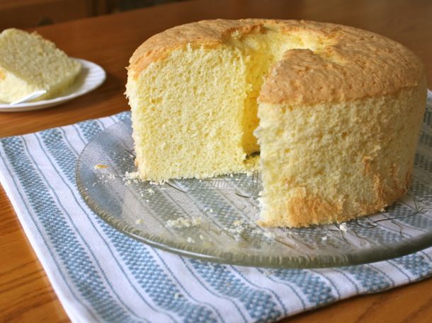 a cake with one slice cut out on a plate