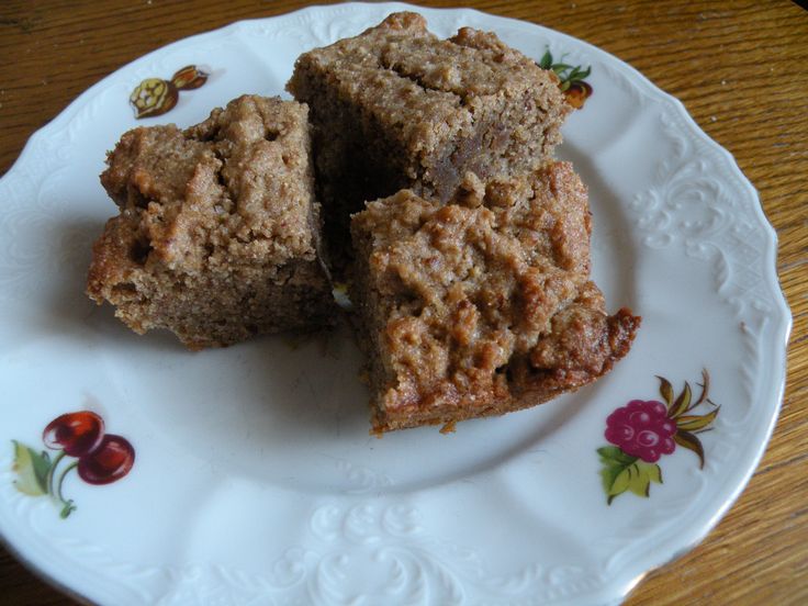 a white plate topped with cookies on top of a table