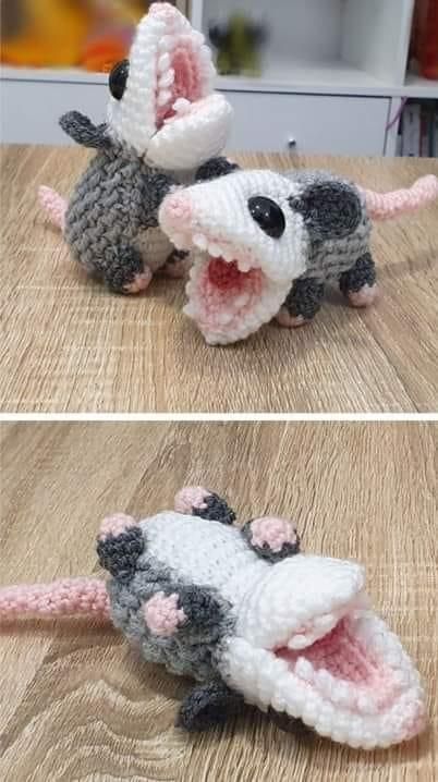 crocheted toy rat with open mouth on wooden table next to another stuffed animal