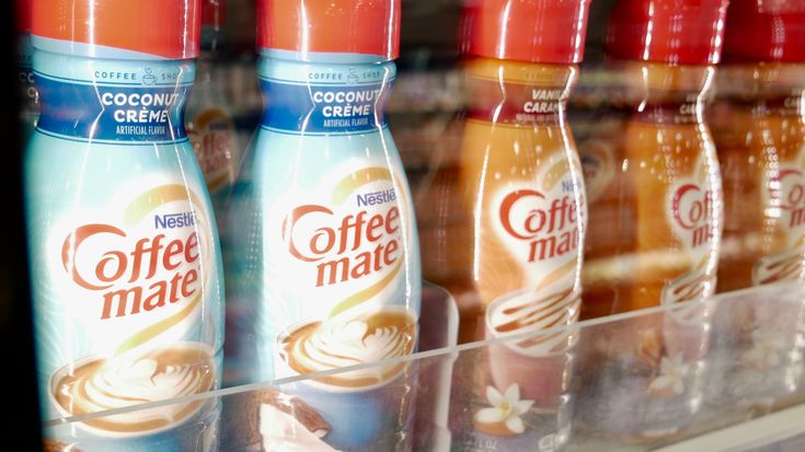 coffee mate drinks are on display in a store