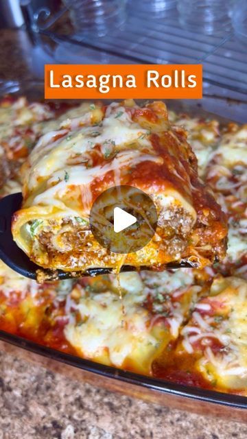 lasagna rolls with cheese and sauce on top