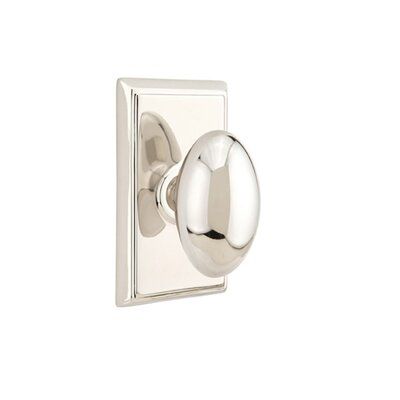 a chrome plated light switch with an oval knob on the front and back side