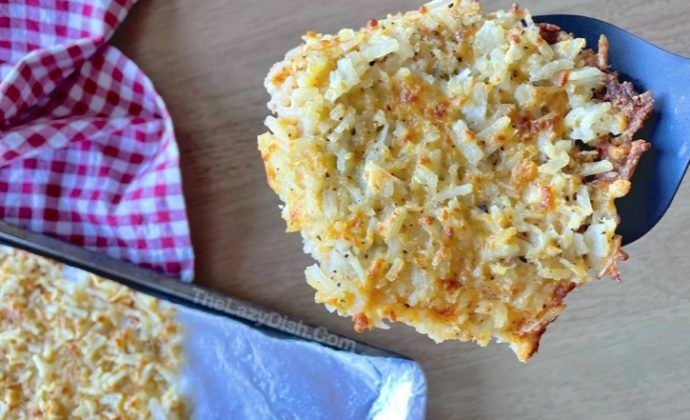 a close up of food on a spoon next to a baking pan and napkins