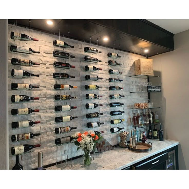 a wine rack with many bottles on it