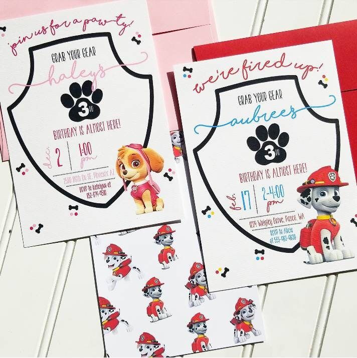 two paw patrol themed birthday party cards with matching envelopes and stickers on them