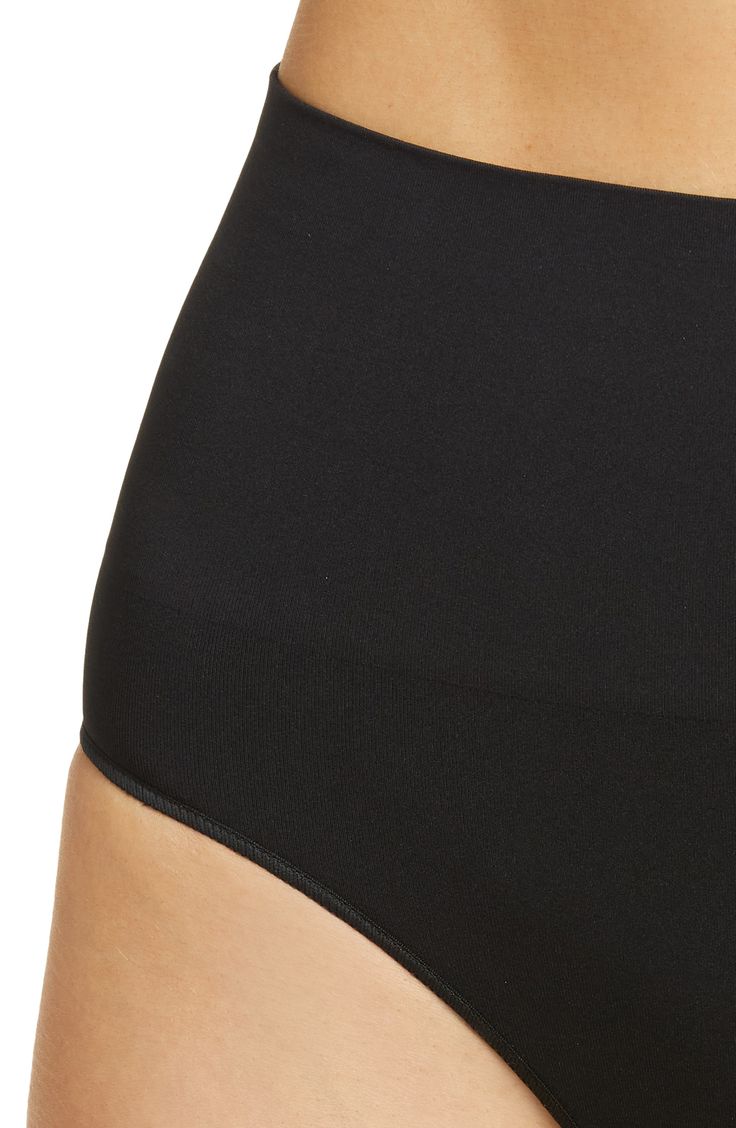 These high-waist briefs have a targeted shaping band that stays in place with no rolling or pinching. Cotton-lined gusset 89% Sensil® nylon, 10% elastane, 1% cotton Machine wash, tumble dry Imported Supportive Full Coverage Black Bottoms, Black Micro-elastic Shapewear Bottoms, Black Full Coverage Shapewear Bottoms, Black Stretch Full Coverage Bottoms, Black Supportive Seamless Bottoms, Black High Waist Shapewear With Contoured Waistband, Black Smoothing Nylon Bottoms, Black Seamless Nylon Shapewear, Supportive Black Shorts