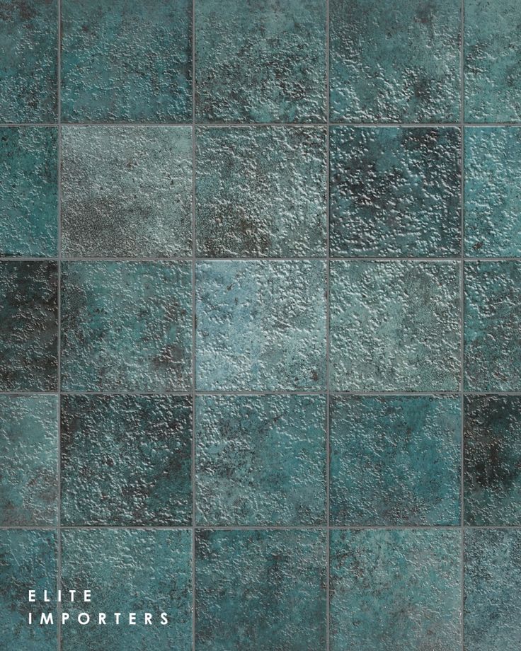 an image of a tile wall that looks like it is made out of green tiles