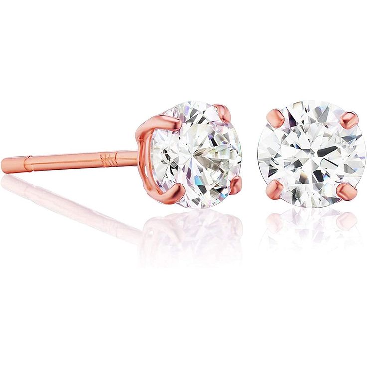 Experience pure elegance and luxury with our breathtaking 14K Rose Gold Solitaire Round Stud Earrings, adorned with dazzling SWAROVSKI Zirconia. These exquisite earrings are the epitome of style and sophistication.Featuring genuine SWAROVSKI Zirconia, these stud earrings are designed to captivate with their exceptional brilliance and sparkle. Each stone is meticulously cut to perfection, reflecting light in the most dazzling way imaginable. The 14k Rose Gold setting adds a touch of warmth and fe Rose Gold Single Diamond Earrings For Anniversary, Rose Gold Diamond Earrings With Single Round Cut, Rose Gold Diamond Cut Round Earrings, Dazzling Rose Gold Round Cut Diamond Earrings, Pink Gold Earrings With Prong Setting For Anniversary, Dazzling Rose Gold Diamond Earrings As Gift, Classic Rose Gold Earrings With Single Diamond, Rose Gold Round Cut Earrings With Single Diamond, Rose Gold Round Cut Single Diamond Earrings