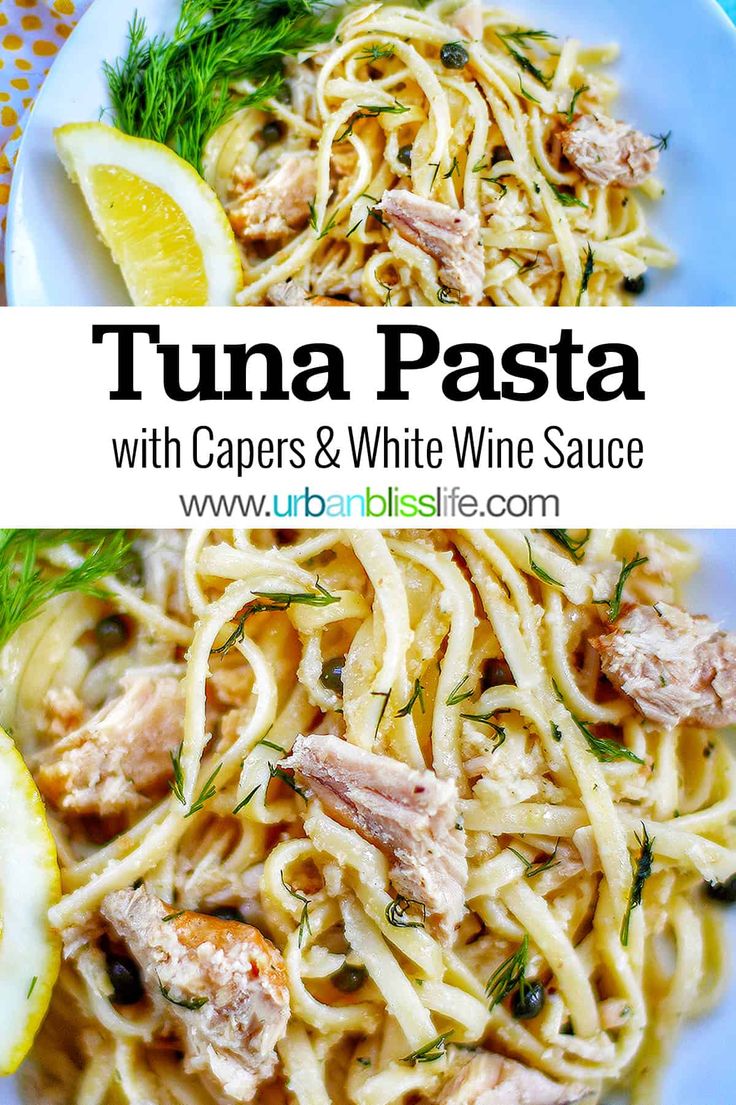 tuna pasta with capers and white wine sauce on a blue plate next to lemon wedges