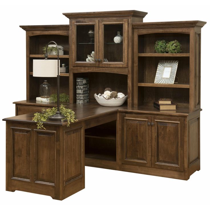 an office desk and hutch with bookshelves on each side, along with a lamp