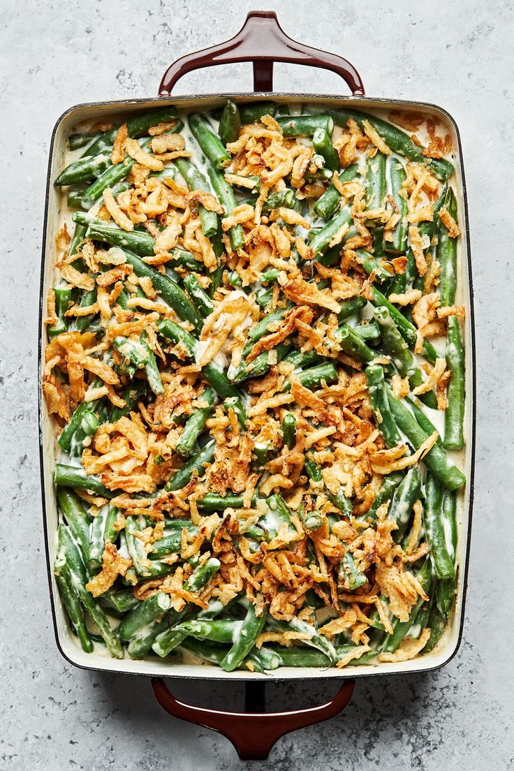 green bean casserole topped with shredded cheese