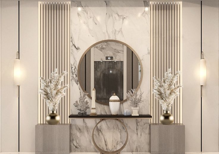 an elegant bathroom with marble walls and flooring, mirrors on the wall, two vases filled with flowers