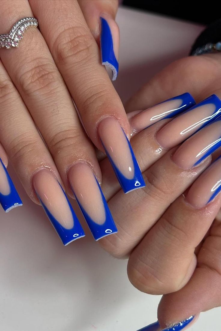 Bold and Striking: Long Square Nails with Royal Blue French Tips Illuminate a Chic Blue Manicure. // Photo Credit: Instagram @_glambyjulia French Tips Blue Nails, Blue French Tip Nails Design, Acrylic Nail Designs Long Square, Royal Blue Nails With Silver, Dark Blue Nails Square, Royal Blue Nails Square, Royal Blue Nails French Tips, Hot Blue Nails, Royal Blue Bling Nails