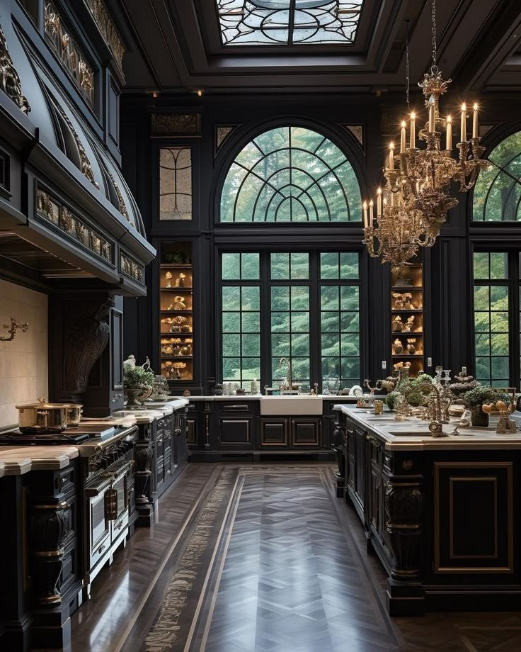 an ornate kitchen with chandelier and marble counter tops in front of large windows